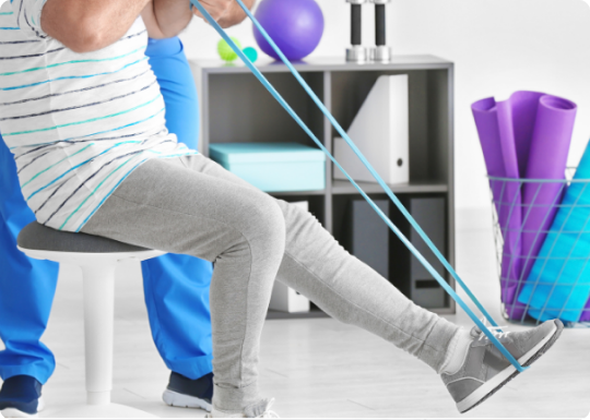 A physiotherapist conducting a home visit to a patient in Dubai, UAE, as part of LIFE WIN's specialized physiotherapy services for orthopedic, neurological, and musculoskeletal conditions.